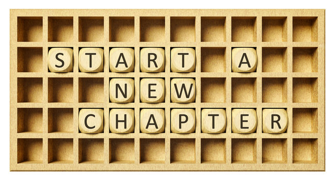 a wooden grid with cubes start a new chapter