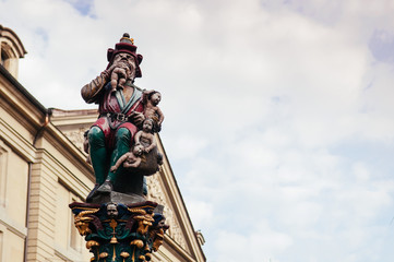 Child Eater Fountain Kindlifresserbrunnen Fountain statue in old town Bern, Switzerland