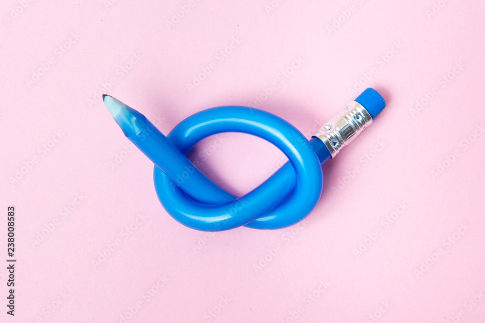 Flexible pencil on pink background. Bent pencils. Flexible business concept. - obrazy, fototapety, plakaty 
