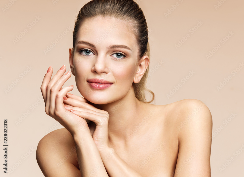 Beautiful girl with flawless skin on beige background. Youth and skin care concept - obrazy, fototapety, plakaty 