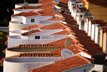 Red Rooftiles Under The Sun In A Mediterranean Town