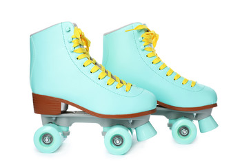 Wall Mural - pair of bright stylish roller skates on white background