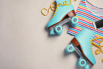 Wall Mural - flat lay composition with quad roller skates and space for text on light background