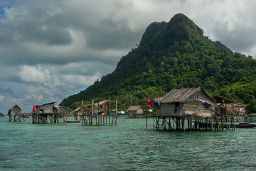 Wall Mural - East Malaysia. Sibuan island near the city of Semporna. Calm in the fishing village of sea Gypsies