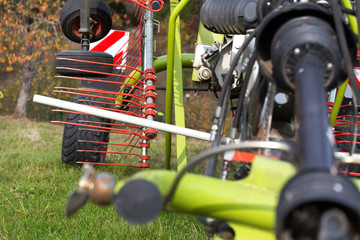 Sticker - farming rotary tedder on a meadow