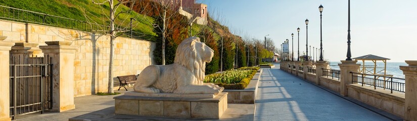 Wall Mural - panorama with sculpture of lion on the embankment in Odessa city in Ukraine