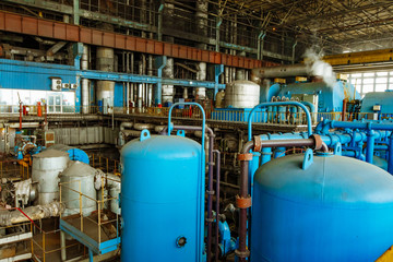 Interior of a hydroelectric plant. Heating and cooling pipes in a power station.