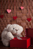 Fototapeta Pokój dzieciecy - Teddy Bear with a Valentine's gift box.