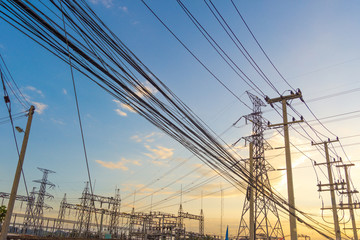 Wall Mural - Electricity concept. Close up high voltage power lines station.