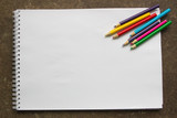 Fototapeta Perspektywa 3d - colored pencils on a white background, blank for the designer