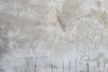 Grey cement wall background, blank crak texture wall background