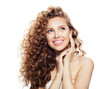 © artmim - Blonde woman with long healthy hair isolated on white background. Spa beauty, cosmetology and facial treatment concept