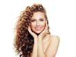 © artmim - Beautiful woman with perfect wavy hair isolated. Spa beauty, cosmetology, facial treatment and wellness concept