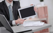© yurolaitsalbert - close up.businessman showing tablet with blank screen