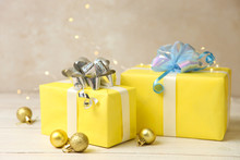 Two Yellow Christmas Gifts