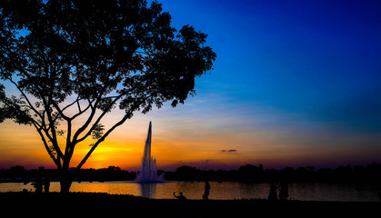 Evening park with people to relax.