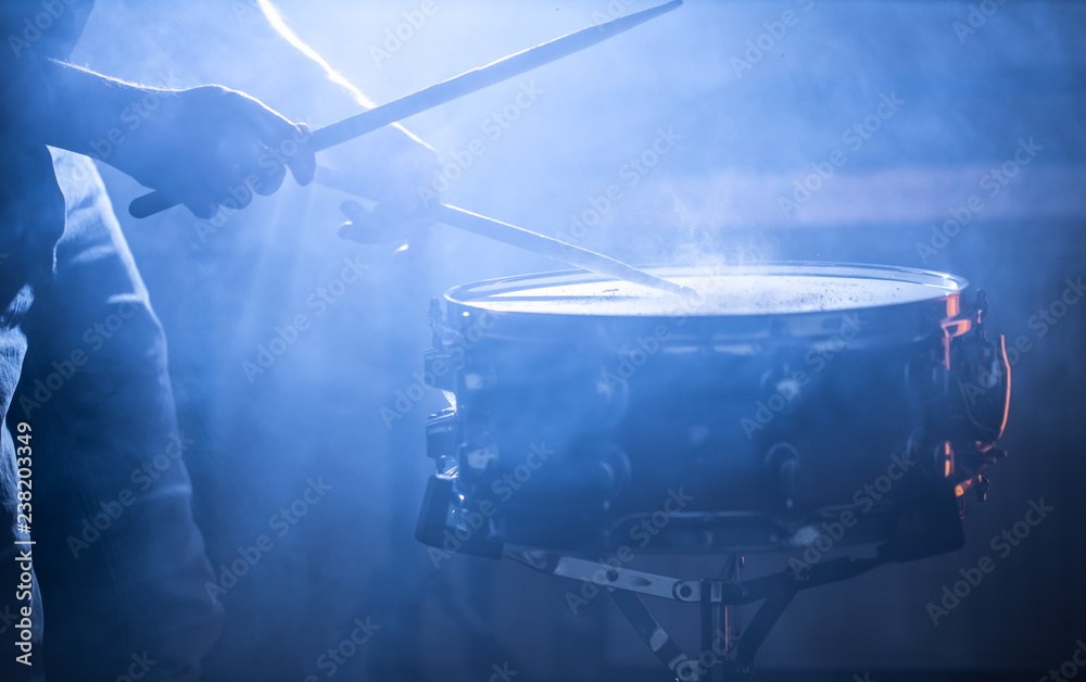 man playing the snare drum on a beautiful colored background Stock ...