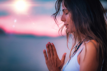 Wall Mural - Meditating. Close Up Female Hands Prayer