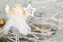 Cute Christmas Angel Holding Star