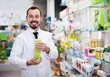 © JackF - Male pharmacist in pharmacy
