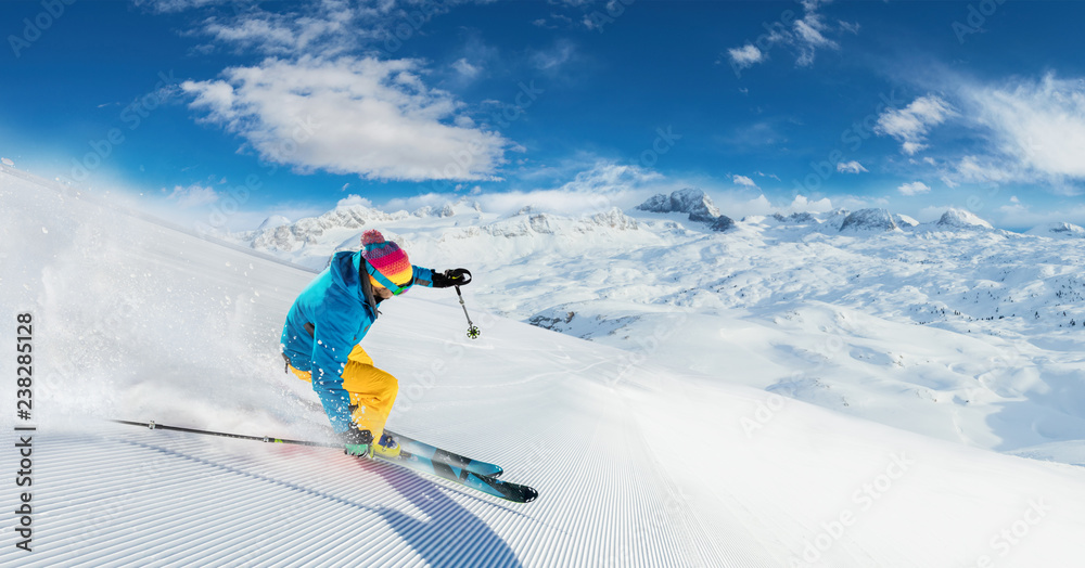 Alpine skier skiing downhill, panoramic format - obrazy, fototapety, plakaty 