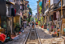 Woman Is Making A Picture Of Hanoi City Railway Perspective View Running Along Narrow Street With Houses In Vietnam