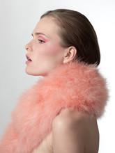 Profile Of Beautiful Woman With Peach Feathers Neck