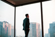 © ReeldealHD images - Businessman looking out at city skyline
