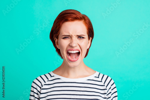 Fotomural Close-up portrait of pretty attractive sad red-haired lady wearing striped pullo