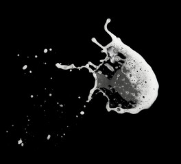 White bubble foam splash explosion in the air on black background,freeze stop motion photo object design