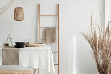 Bright dining room designed with natural materials