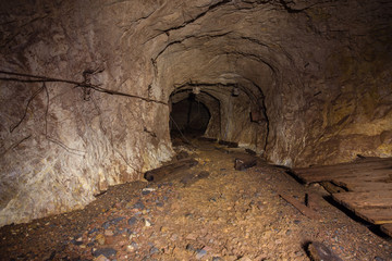 Underground abandoned gold iron ore mine shaft tunnel gallery passage