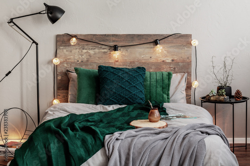 Emerald Green And Grey Bedding On Double Bed With Wooden