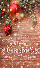 christmas decorations with fir tree branch on wooden background with snow, blurred and text merry ch