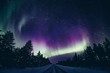 Colorful polar arctic Northern lights Aurora Borealis activity in winter Finland