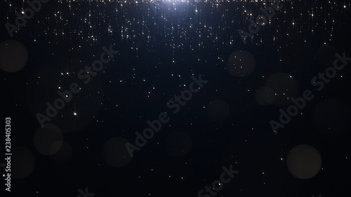 Fotografia  Glamorous golden particles on a black background