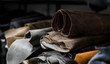 © Volodymyr_sh - Different pieces of leather in a rolls. The pieces of the colored leathers. Rolls of natural brown and black and other leather. Raw materials for manufacture of bags, shoes, clothing and accessories.