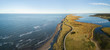 © edb3_16 - Aerial panoramic view of a beautiful sandy beach on the Atlantic Ocean Coast. Taken in La Dune de Bouctouche, New Brunswick, Canada.