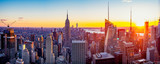 Fototapeta Na ścianę - New York City / Manhattan skyline panorama with urban skyscrapers at sunset, USA.