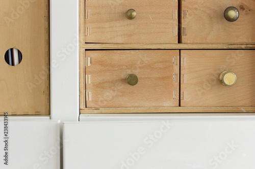 Fotografia, Obraz cabinet with drawers on wooden background
