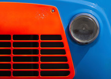 Cropped Image Of Blue Vintage Car With Orange Grille