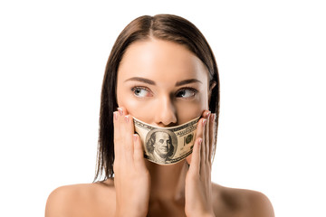 Wall Mural - young naked woman with dollar banknote on mouth looking away isolated on white