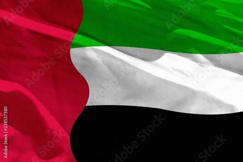 Fotografie, Obraz Waving United Arab Emirates flag for using as texture or background, the flag is