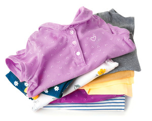 Wall Mural - Stack of colorful cottong clothes isolated.Pile of multicolored clothing.