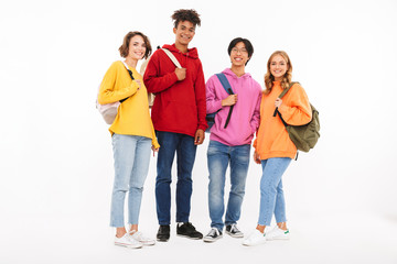 Wall Mural - Group of cheerful teenagers isolated