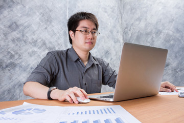 business man working on laptop computer