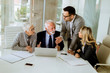 © BGStock72 - Businesspeople in conference room during a meeting in office