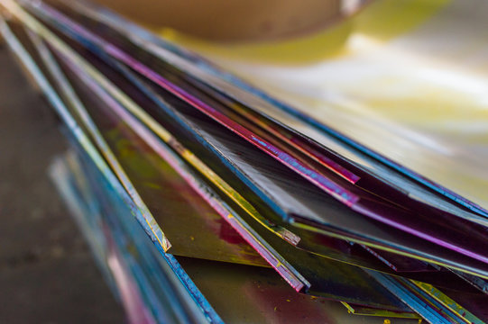 Sheets plates of print Typography industry ink with cmyl colors cyan magenta yellow black letterspress lastre print