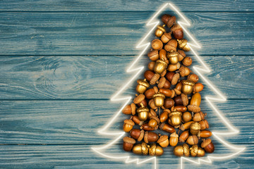 Wall Mural - merry christmas and happy new year CARD background handmade handicraft garland of colored acorns, decorative toys and a wooden christmas-tree - Image 