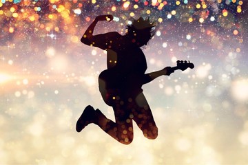 Portrait of a Musician Jumping while Playing